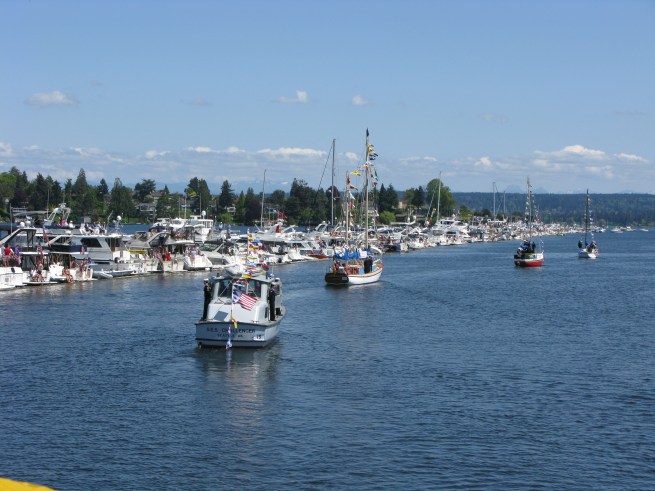 Fleet Passing The Log Boom 